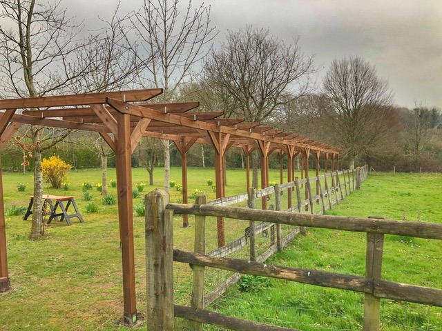 An example of 20 meter pergola, and surrounded by a view in the country side.